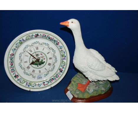 A Portmeirion 'Botanic Garden' wall clock and a Border Fine Arts Goose by Russell Willis, 13'' tall.