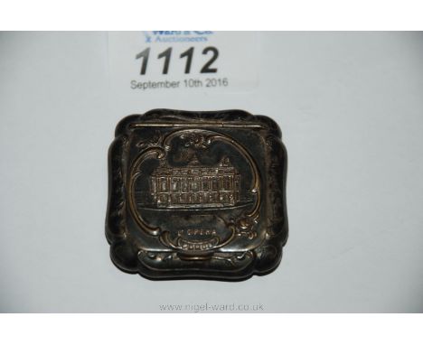 A small Silver gilt Patch Box with embossed decoration and image of 'L'Opera, Paris', 13 1/4'' square.