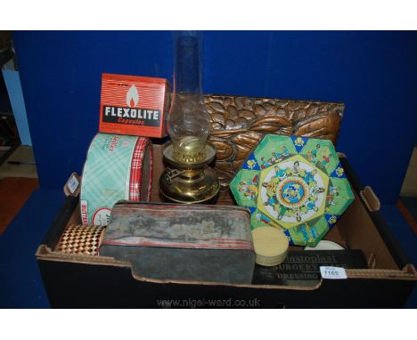 Miscellaneous old tins including Cadbury's Girl Guide tin, copper embossed plaque, oil lamp etc