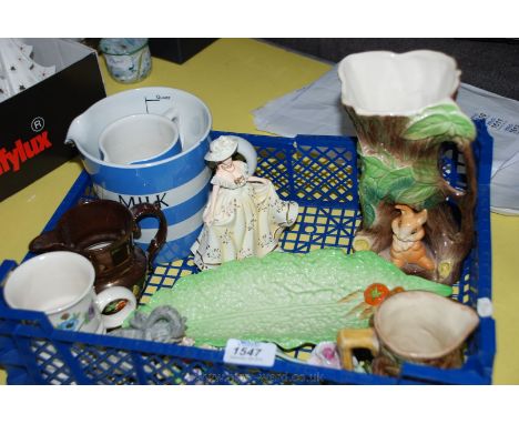 A quantity of china including Hornsea Jug, two Cornishware Jugs, a Lustre Jug, Carltonware Dish and Mug, two Wade figures, et