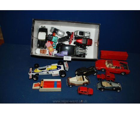 A quantity of die-cast Matchbox and Corgi cars and lorries including Royal Mail lorry, Williams Formula 1 car, etc