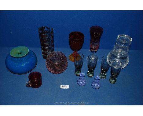 A quantity of coloured glass including squat Mdina vase, Scandinavian shot glasses, miniature vases and a Laura Ashley flask/