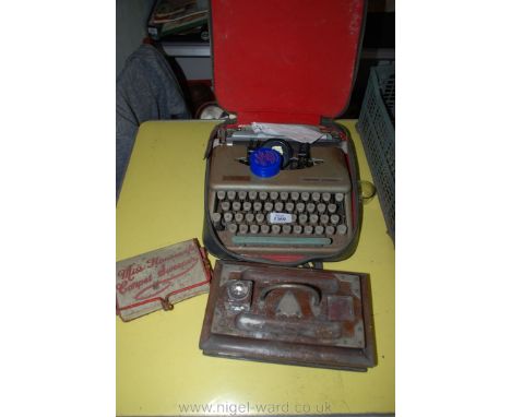 A circa 1900 Desk pen and ink Stand, a tin-plate Toy "Miss Housewife Carpet Sweeper" (handle missing) and an "Empire Corona" 