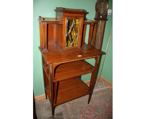 An ornate Edwardian Mahogany Hall Cabinet having brass galleried central glazed cupboard with diamond motif, five heavy bevel