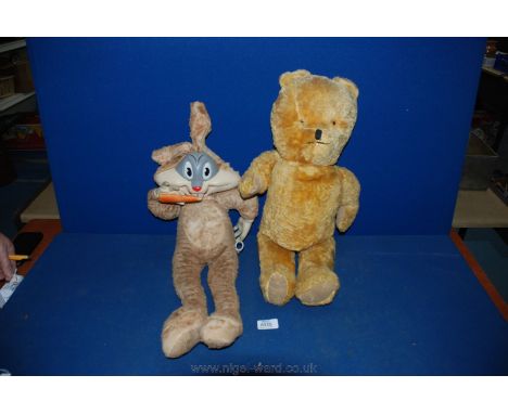 A 1962 Mattel Bugs Bunny and a vintage jointed Pooh Bear.