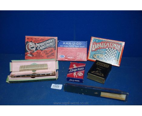 Four vintage card games including strip tease, sum-it and kan-u-go, a harmonica, draught set and an early kaleidoscope by Mir