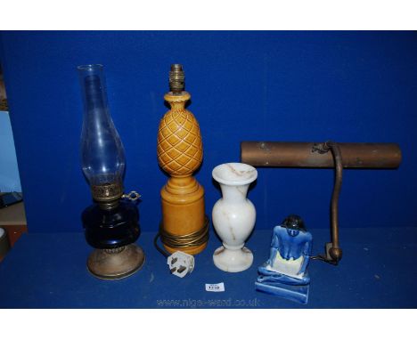 An Oil Lamp with blue glass reservoir, marble base, table lamp and a picture light.