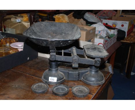 A set of antique Avery Scales and three weights