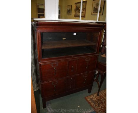 An unusual Globe Wernicke Office Compactum/Filing Cabinet, having shaped top, single pane up and over glazed door opening to 