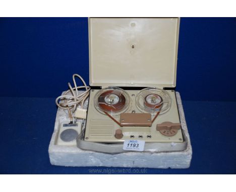 A Benkson-690 reel to reel Tape Recorder complete with remote control.