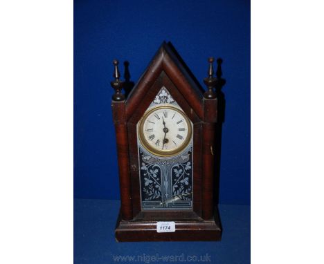 An antique Ansonia 'Gothic' clock, labelled to rear.