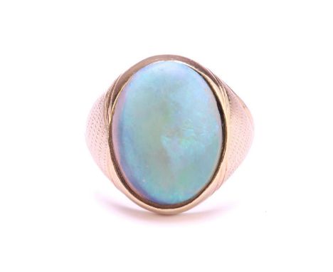 A signet ring set with precious opal, where the oval cabochon displaying mild play-of-colours ranging from green to purple, a