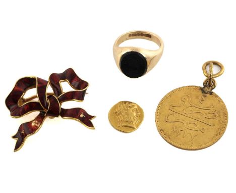 A 9ct gold signet ring, an enamel brooch, a pendant and a coin; A signet ring consists of an oval onyx panel inlay with a coa