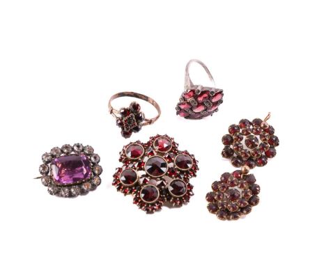 A garnet cluster brooch and ring, and other paste jewellery; the brooch comprises seven larger rose-cut garnets in collets, s