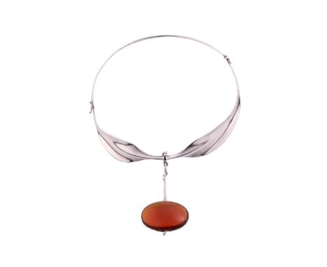 Georg Jensen - 'Neck Ring' with oval citrine drop pendant; comprising an articulated hook and loop opening neck collar, dangl