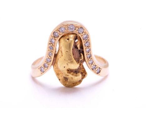 A nugget ring embellished with diamonds, featuring a yellow metal nugget (tests as high carat gold) approximately measures 15