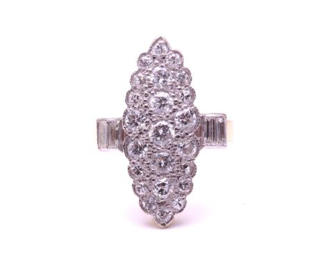 A diamond-set panel ring in 18ct gold, the marquise-shaped ring head comprises circular-cut diamonds, pavé-set on a scalloped