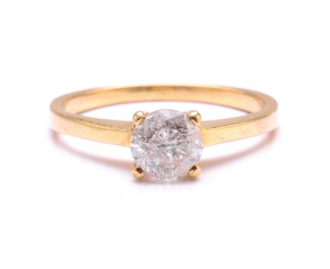 A diamond solitaire ring, comprising a single round brilliant-cut diamond of approximate 5.4 x 5.4 x 3.5 mm, claw set in a hi