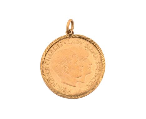 A Charles &amp; Diana Royal Wedding souvenir medallion mounted as a pendant, July 29th 1981, Birmingham hallmarked '375' with