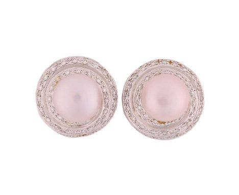 A pair of pearl and diamond earrings; each comprises a round button-shaped silver pearl with pink overtones, set in a swirl s