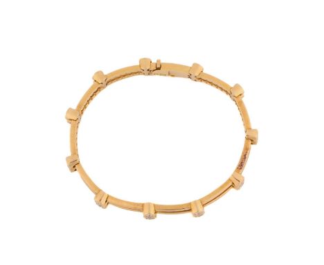 A diamond-set bracelet, comprising two cords with sections of twenty-two collet-set diamonds stringing through, each approxim