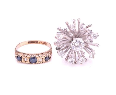 A three-stone half hoop ring in 9ct gold, and another; comprising two sapphires and a replacement paste, flanked by star-set 