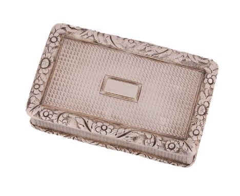 A George IV silver snuff box, rounded rectangular with applied, cast foliate border, engine-turned cover and raised, vacant, 