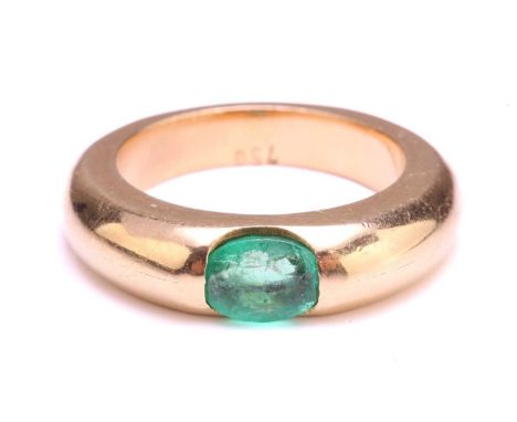 A gypsy ring set with oval emerald, containing an oval-cut emerald of 6.2 x 4.8 mm, tension set to a flat-edged shank, yellow