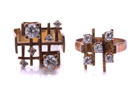 A Modernist ring, set with six cubic zirconia in an angled framework, to an angled shank; together with another in similar st