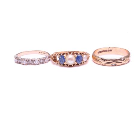 Three gem-set rings; including a diamond half-eternity ring in 9ct gold, comprising nine diamonds alternating in illusion set