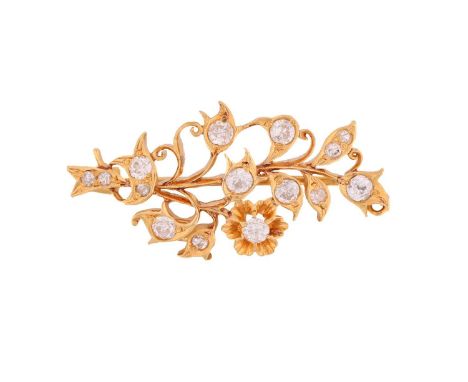A flower spray brooch set with diamonds, comprises fifteen various-sized old-European cut diamonds set in the realistically s