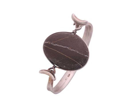 Torun - 'Arm Ring' with polished rock, a tension clamp opening bangle with an oval polished rock panel set in a ring mount, t