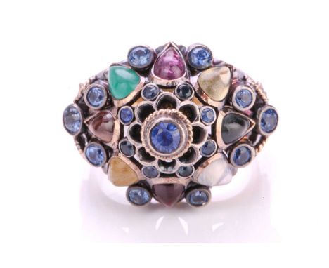 A multi-gem set Noppakao Thai princess ring, the domed ring head has set with layers of polychromatic gemstones such as sapph