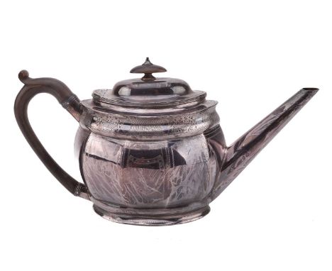 A George III silver teapot, London 1800 by Samuel Henell, with auricular shaped pear wood handle and knop, the panelled doubl