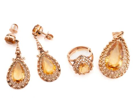 A citrine demi-parure, including a pair of drop earrings, a ring and a pendant; The pair of earrings each features a large pe
