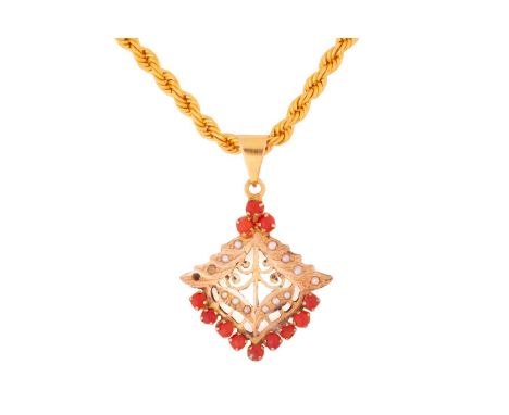 A precious coral and seed pearl pendant on a twisted rope chain, the pendant of foliate design comprises a scrolled openwork 