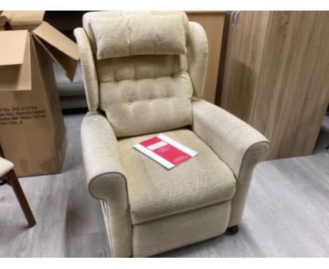 A Willowbrook electric riser recliner with manual