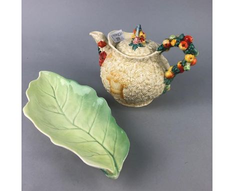 CLARICE CLIFF 'CELTIC HARVEST' PATTERN TEA POT, 15cm high, along with a Royal Winton leaf shaped dish