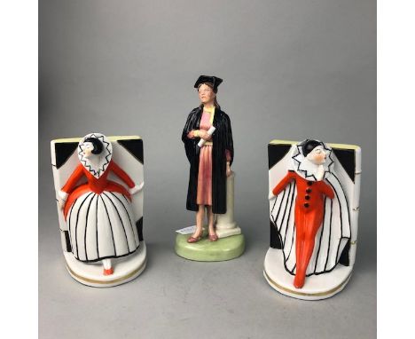ROYAL DOULTON FIGURE OF 'THE GRADUATE', 23cm high, HN 3016, along with a pair of bookends, two Beswick golden eagle bottles, 