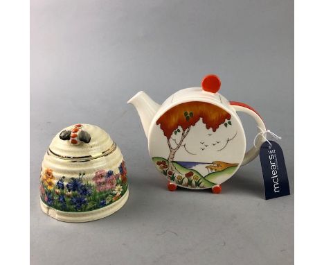 ART DECO STYLE WEDGWOOD TEA POT, decorated with the orange taormina pattern by Clarice Cliff, 13.5cm high, along with a Clari