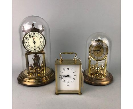 KUNDO MANTEL CLOCK, with dome, 30cm, high, along with a similar Hermle clock and a quartz carriage clock (3)