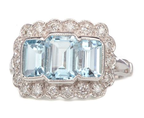 AQUAMARINE AND DIAMOND RING,the emerald cut aquamarines totalling approximately 1.74 carats, within a diamond border totallin