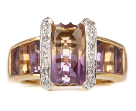 AMETRINE DRESS RING,the central ametrine flanked by round brilliant cut diamonds, on amethyst and citrine shoulders, marked 1