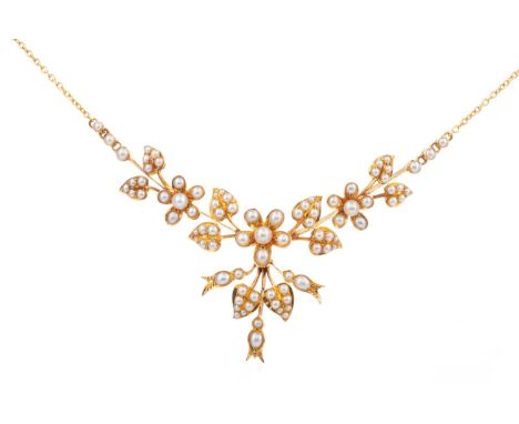 SEED PEARL SPRAY NECKLET,the central floral panel set with seed pearls, with pearl set barrel clasp, unmarked, in fitted box