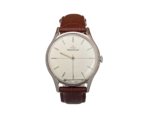 JAEGER LE COULTRE STAINLESS STEEL MANUAL WIND WRIST WATCH  the round dial with baton hour markers, 34mm case, on a brown leat