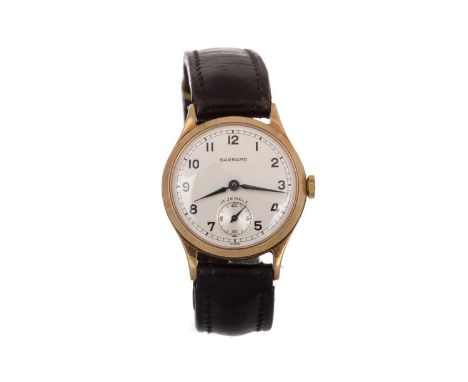 GARRARD NINE CARAT GOLD MANUAL WIND WRIST WATCH the round dial with Arabic hour markers, outer seconds track in black, 30mm c