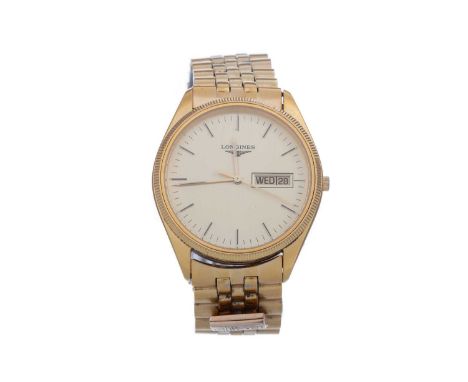 LONGINES  GOLD PLATED QUARTZ WRIST WATCH the round dial with baton hour markers, outer seconds track in black, day and date a