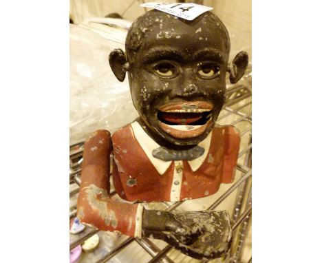 Jolly Negro aluminium money box and a Kodak camera