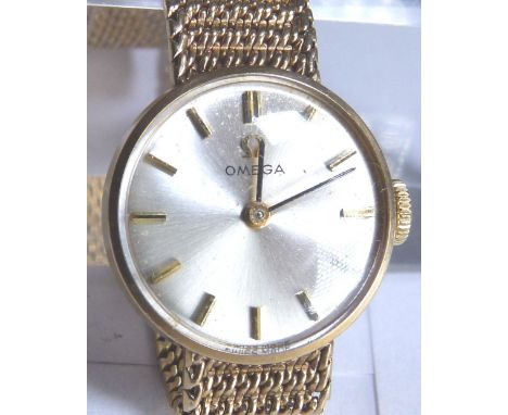 9 CT OMEGA WRISTWATCH. Ladies 9 ct gold Omega wristwatch on a 9 ct gold Omega bracelet, 22.6 g CONDITION REPORT: The total we