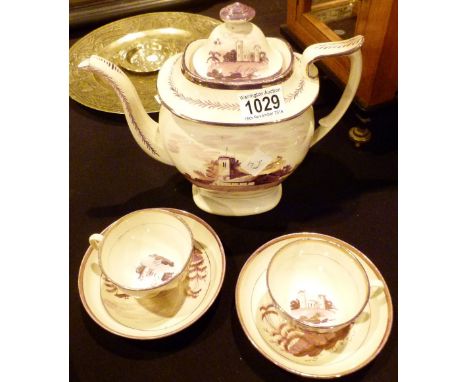 Sunderland lustre tea pot and two cups and saucers